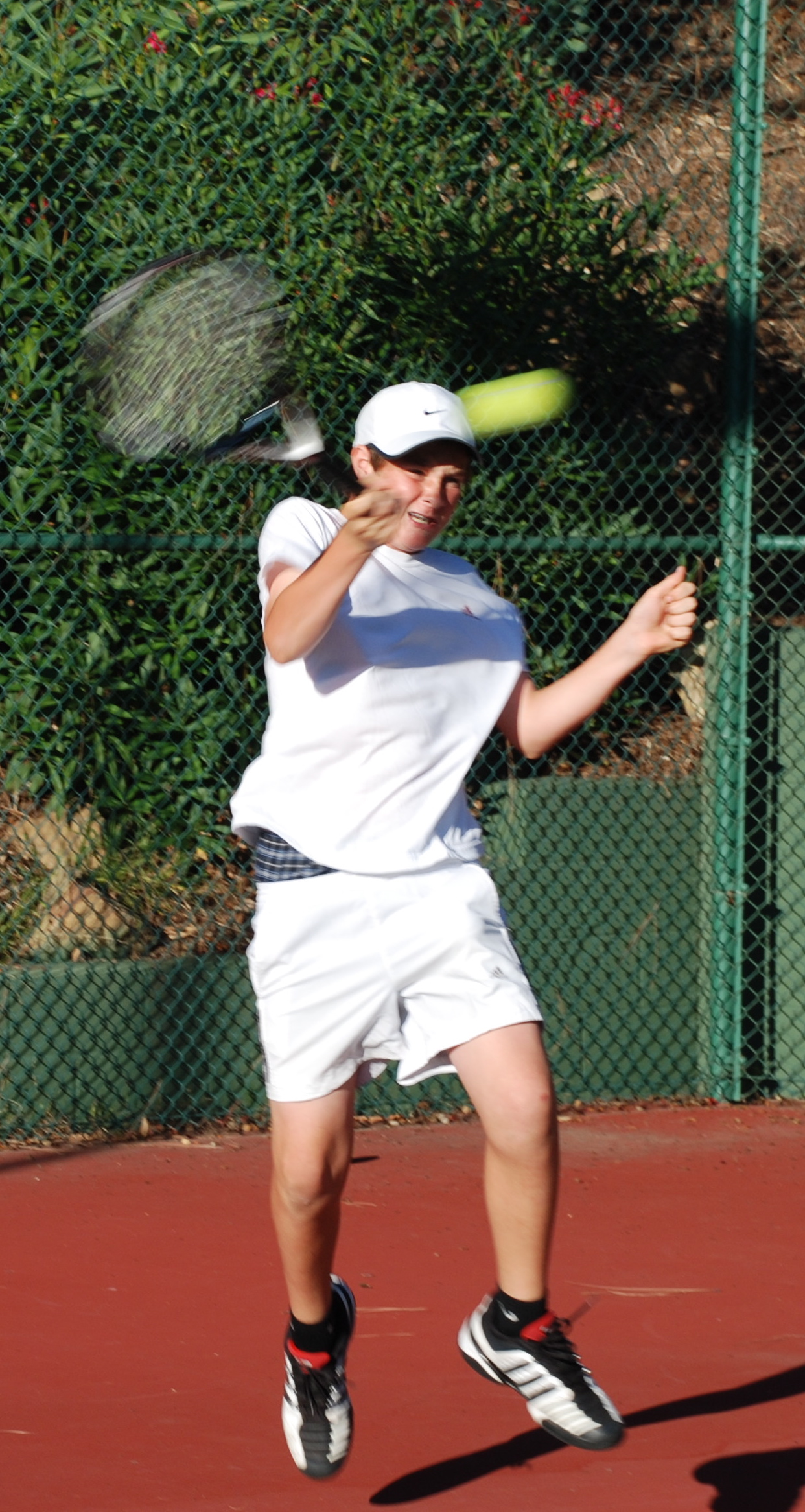 Palisadian Robbie Bellamy hits a forehand at the Matador tournament in Northridge. Photo: Heidi Wessels